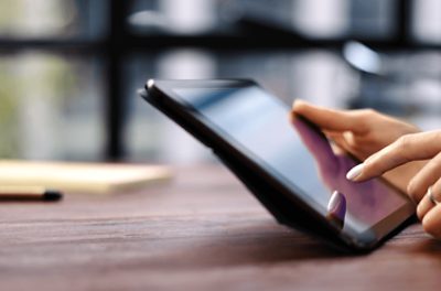 A person using a tablet.