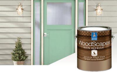 The front door and exterior of a home with a can of WoodScapes Rain Refresh.