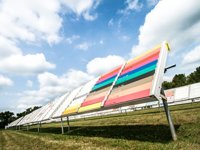 EPS does extensive testing to deliver innovative products - lab tech holding test tube