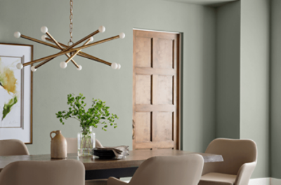 Modern dining room painted Sherwin Williams 2020 color of the year SW 9130 Evergreen Fog.
