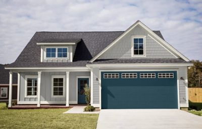 Sherwin-Williams featured paint colors on a 1.5 story home with a 2 car garage.