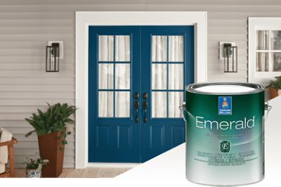 Outside double doors painted blue showcasing the white Emerald Trim.