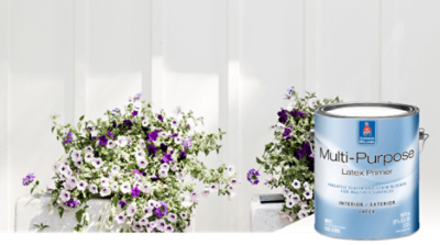 A white wall with purple and white flowers next to it. Multi-Purpose Latex Primer.