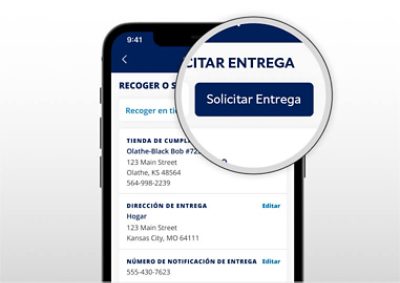 Una lupa sobre un teléfono móvil que muestra un botón de solicitud de entrega de pintura.