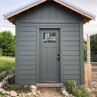 A chicken coop painted Pewter Green sw 6208.