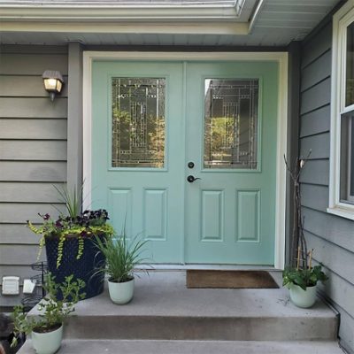 A set of painted front doors. S-W featured color: SW 6471 Hazel. Photo credit @yunwilliams7.