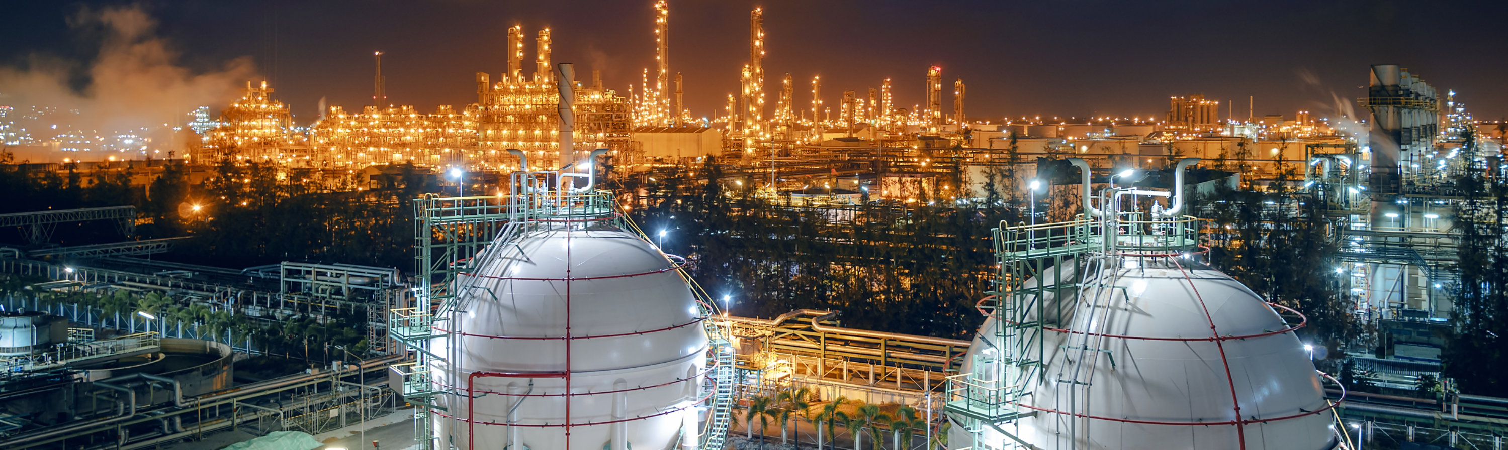 Gas tanks at a refinery.