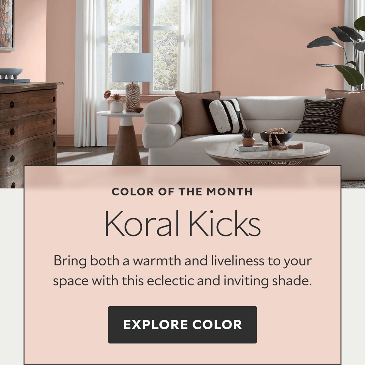 A living room with a white sofa and walls painted Koral Kicks SW6610. Color of the month: Koral Kicks. Bring both a warmth and liveliness to your space with this eclectic and inviting shade. Explore color.