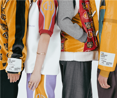 Up close of four people wearing Dapper Dan's designs.