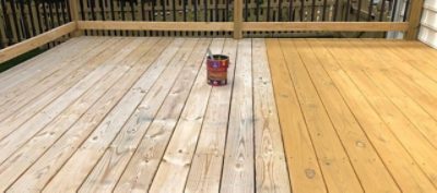 A half stained, outdoor deck. S-W product featured: SuperDeck Stain.