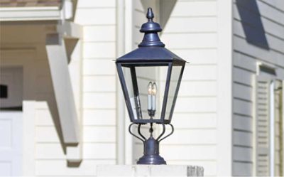 An outdoor light painted dark blue-gray.