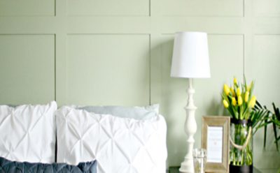 Light green board and batten wall.