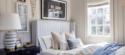 Painted wood paneling in a bedroom.