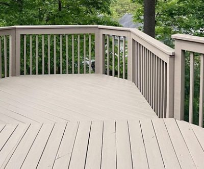 A deck stained a light beige.