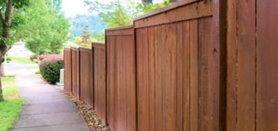 A freshly stained wood fence.