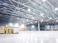 Photo of gray floor in a large open industrial building