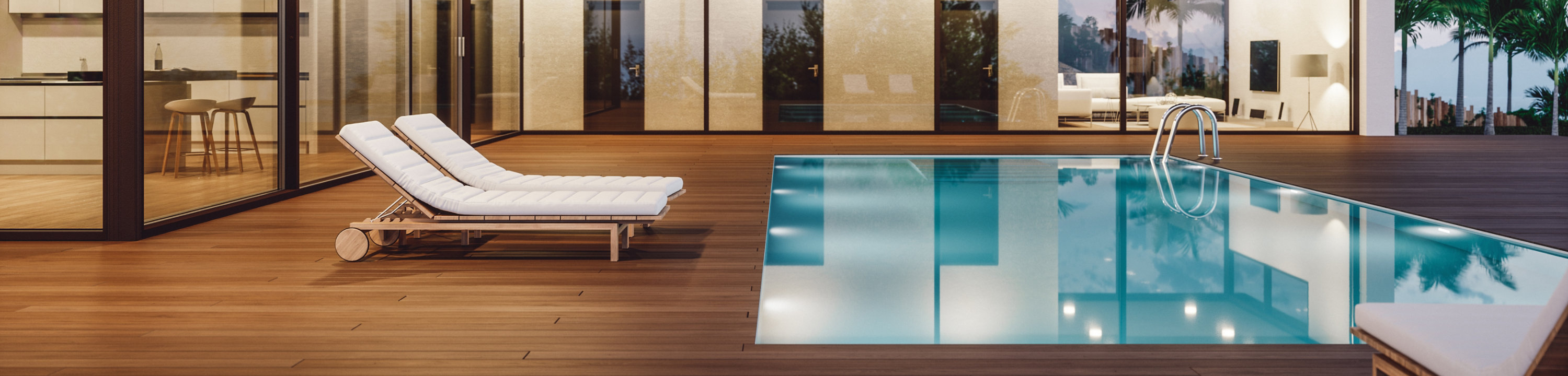 Modern outdoor area with a wooden decking and two lounge chairs beside a swimming pool.