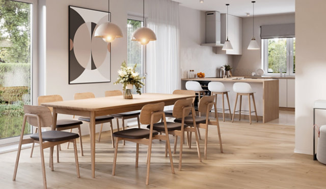 Contemporary kitchen and dining space with light wood cabinetry and furniture, showcasing natural wood finishes and bright interior design.
