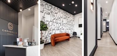 Sleek, modern design of dental facility interior featuring black and white color scheme, waiting area with accent wall of line-drawn face pattern and rust orange sofa, white walls and black trim in high-ceilinged corridors.