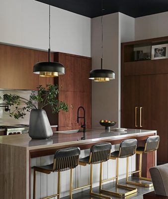 Modern kitchen with central island, wooden cabinetry, and pendant lighting with Sherwin-Williams Alpaca walls and Tricorn Black ceiling.