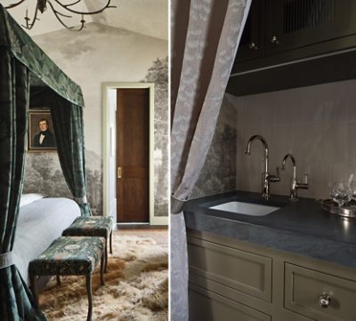 Image of a bedroom with a canopy bed and a wet bar kitchenette with a sink and chrome faucets behind a curtain. 
