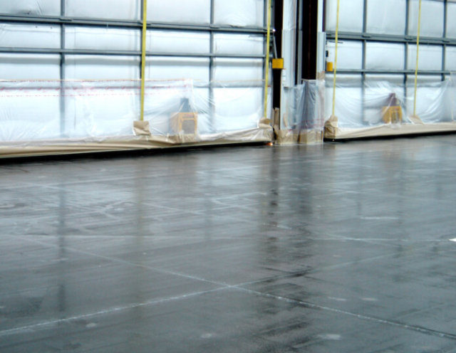 Treated joints in resinous floor.