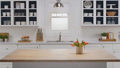 A modern kitchen and freshly painted cabinets SW colors featured: SW 9178