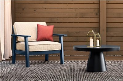 A chair and table in an outdoor seating area.