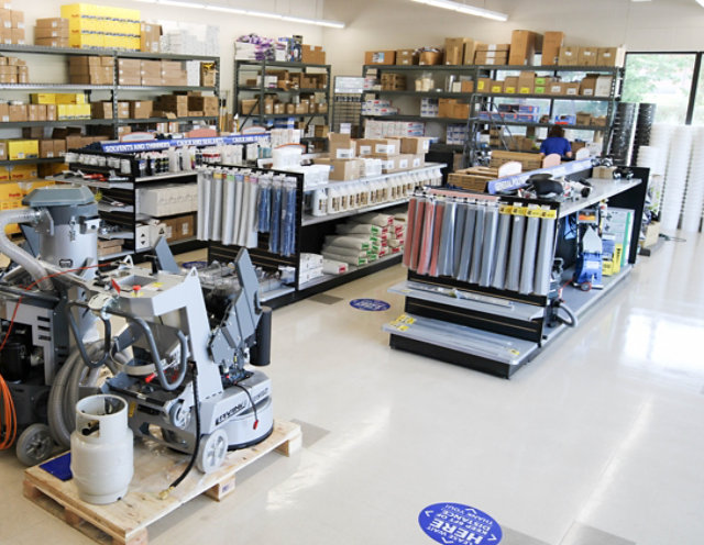 High Performance Flooring store showroom featuring equipment and supplies.