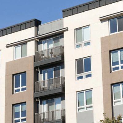 An apartment building with balconies.