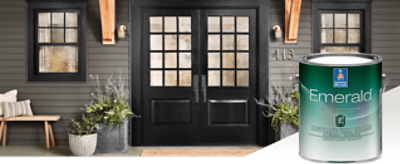 Double front doors painted black with vinyl siding and a window on each side with black painted frames and a can of Emerald Exterior paint.