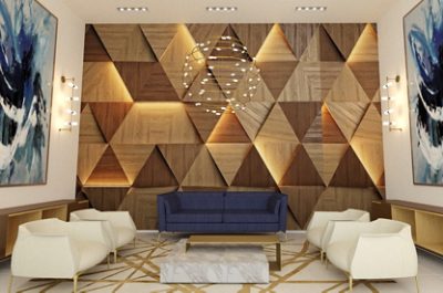 Modern sitting area with high ceilings, abstract art, and a wood-paneled accent wall in a pattern of repeating triangles.