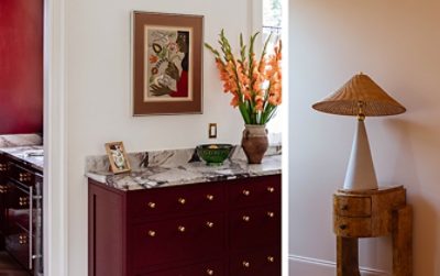Dabito’s home’s chic interior details, including the marble-topped cabinet painted Sherwin-Williams Borscht and a unique lamp on a small wooden table. 