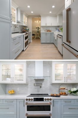 Modern kitchen with white upper cabinets and pale blue lower cabinets, pastel blue variegated backsplash, light wood floors and can lighting.