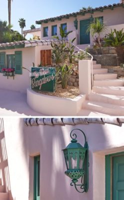 Exterior of the Mesa Bungalows project, a Spanish adobe style home painted Charming by Sherwin-Williams with green doors and windows and a custom neon sign.Exterior of the Mesa Bungalows project, a Spanish adobe style home painted Charming by Sherwin-Williams with green doors and windows and a custom neon sign.