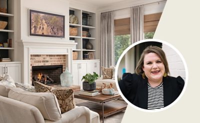 Inviting living room with brick hearth, built-ins, and comfortable sofas topped with throw blankets and pillows.