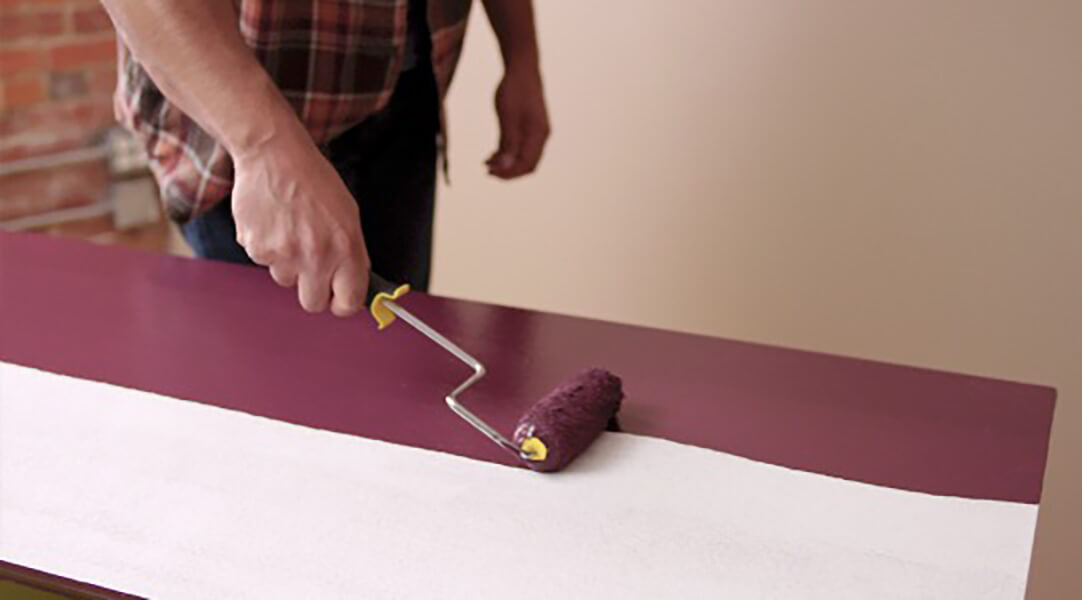 Using a mini paint roller onto the surface of a table. S-W colors featured: SW 2704.