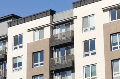 An apartment building with balconies.