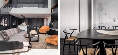 Left image: Sleek living room area with black and white color scheme, modern terracotta-colored chairs and large sofa in front of stairwell to an upstairs landing overlooking the space. Right image: Shot of black dining table with black wishbone chairs in front of framed oversize black and white art photo of a cathedral-like space.