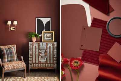 A split image featuring a Rewild Continuity Color, Red Barn, both on walls with a patterned chair and decorative cabinet and as a color sample in a flat lay displayed with fabric swatches, a paint drawdown, and florals.