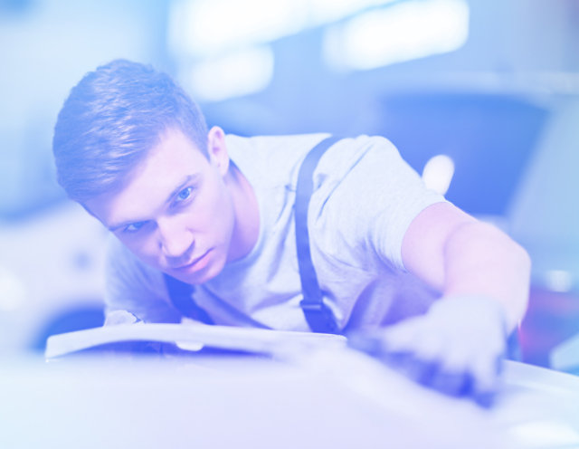 Octoral product being reviewed on a car panel