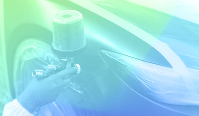 Paint application via a spray gun.