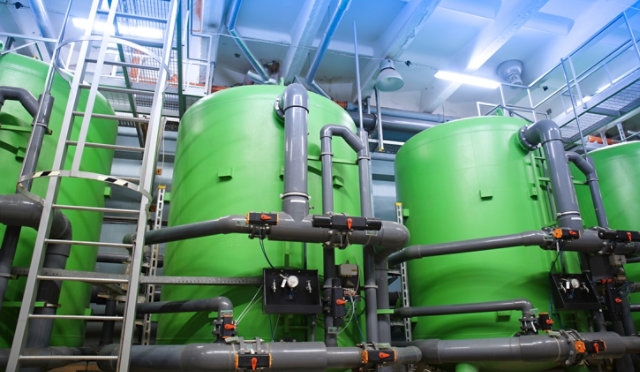 water treatment tanks at industrial power plant