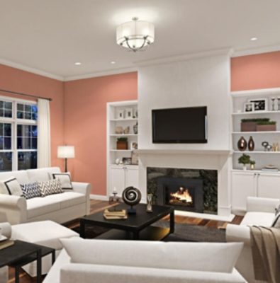 A living room painted a pink-orange hue.