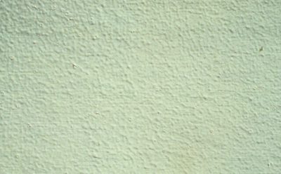 A close up of a wall that has bubbling fisheye paint