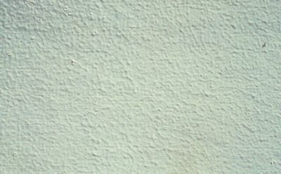 A wall with small paint bubbles. 
