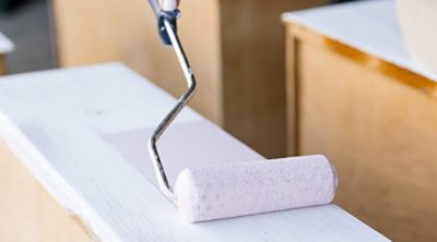 Painting a dresser with a roller and pink paint. SW colors featured: SW 6289, SW 7666