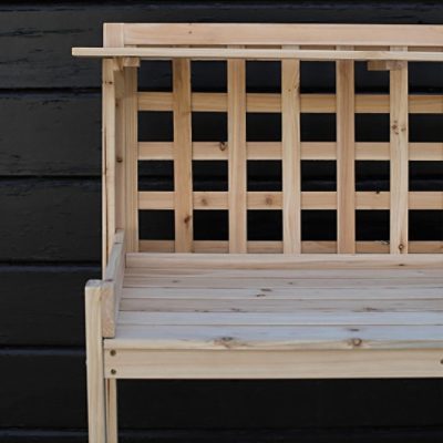 Preparing to paint an outdoor wooden paint stand