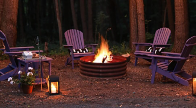 Painted adirondack chairs near a fire pit.