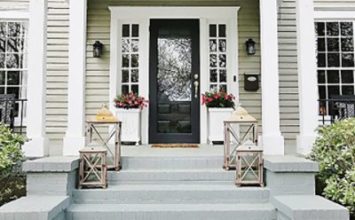 Exterior of a house with brick walkway.